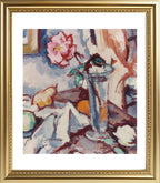 Pink rose in a glass vase with fruit