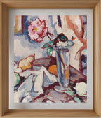 Pink rose in a glass vase with fruit
